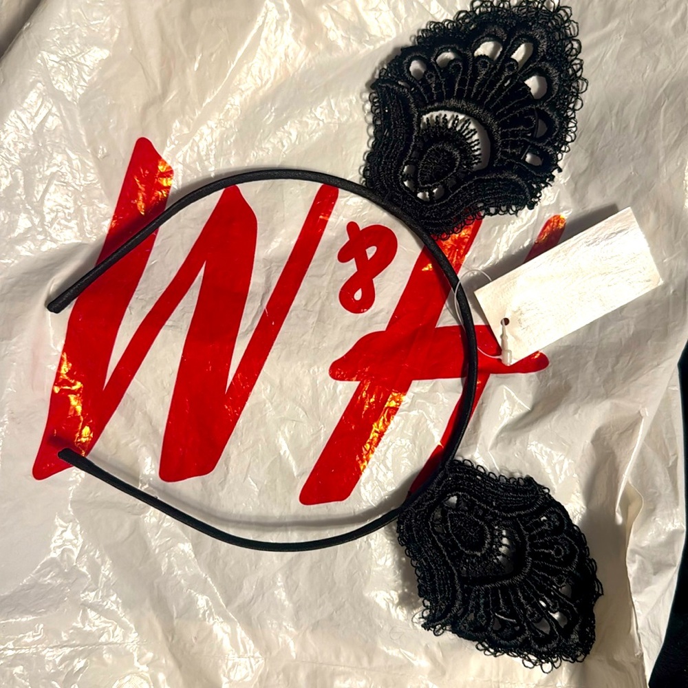 Brand new, black knitted cat ears.